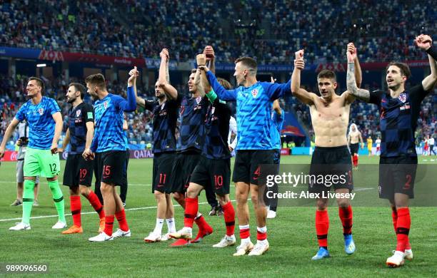 Croatia players celebrate following their sides victory in a penalty shoot out during the 2018 FIFA World Cup Russia Round of 16 match between...