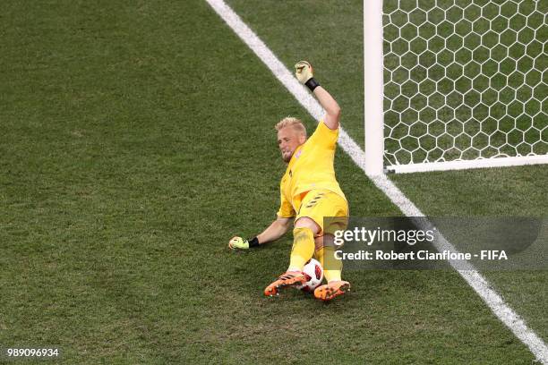 Kasper Schmeichel of Denmark saves the first penalty from Milan Badelj of Croatia in the penalty shoot out uring the 2018 FIFA World Cup Russia Round...