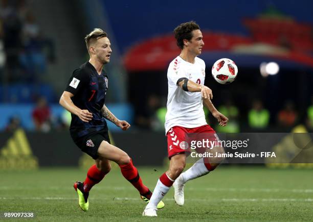 Ivan Rakitic of Croatia and Thomas Delaney of Denmark in action during the 2018 FIFA World Cup Russia Round of 16 match between Croatia and Denmark...