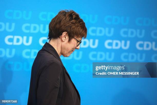 Secretary General of the Christian Democratic Union Annegret Kramp-Karrenbauer leaves after delivering a statement after a party leadership meeting...