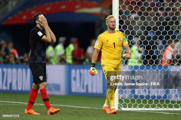 Milan Badelj of Croatia reacts after Kasper Schmeichel of Denmark saved the first penalty from Milan Badelj in the penalty shoot out during the 2018...