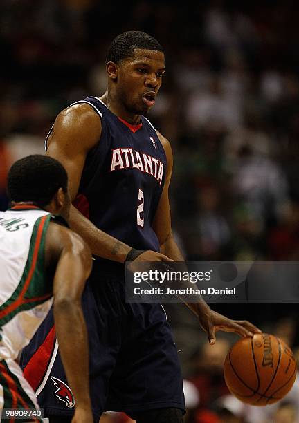 Joe Johnson of the Atlanta Hawks dribbles with ball agaiunst the Milwaukee Bucks in Game Six of the Eastern Conference Quarterfinals during the 2010...