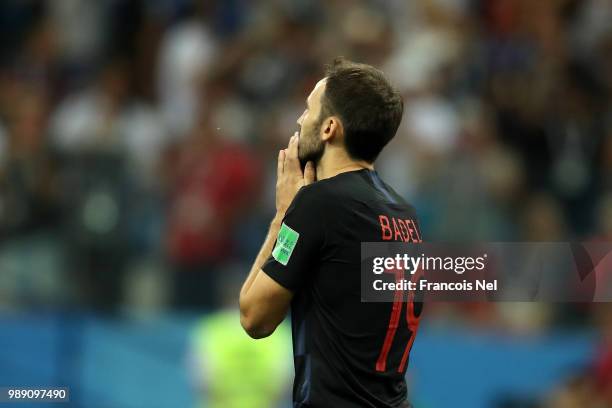 Milan Badelj of Croatia reacts after missing the first penalty in the penalty shoot out during the 2018 FIFA World Cup Russia Round of 16 match...