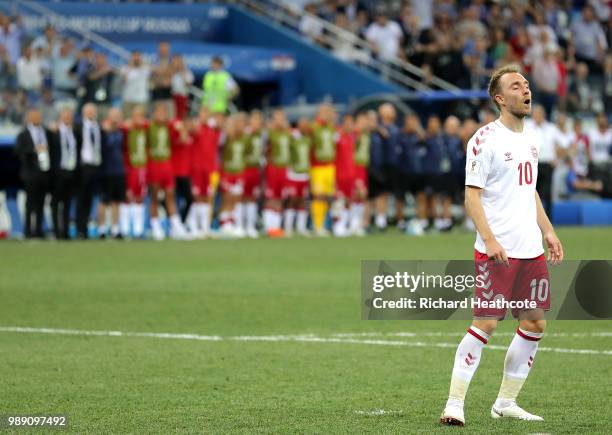 Christian Eriksen of Denmark looks dejected after missing his teams first penalty during a penalty shoot out during the 2018 FIFA World Cup Russia...