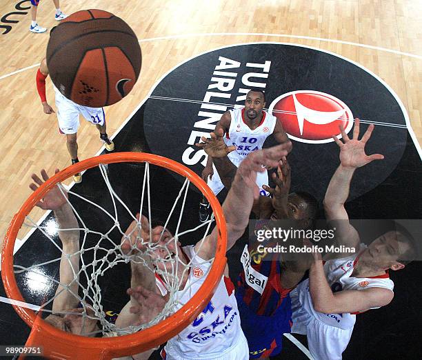 Sasha Kaun, #24 of CSKA Moscow competes with Pete Mickeal, #33 of Regal FC Barcelona during the Euroleague Basketball Senifinal 1 between Regal FC...