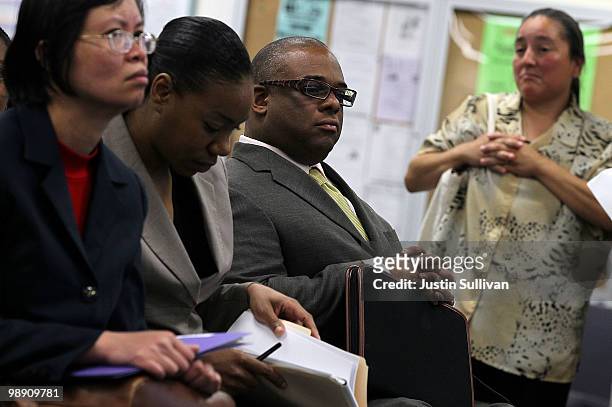 Job seekers wait to be interviewed by potential employers during a hiring event at the Career Link Center One Stop job center May 7, 2010 in San...