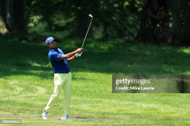 Anirban Lahiri of India plays a shot on the second hole during the final round of the Quicken Loans National at TPC Potomac on July 1, 2018 in...