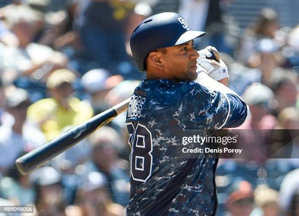 Tyson Ross of the San Diego Padres hits a single during the fourth inning a baseball game against the Pittsburgh Pirates at PETCO Park on July 1,...