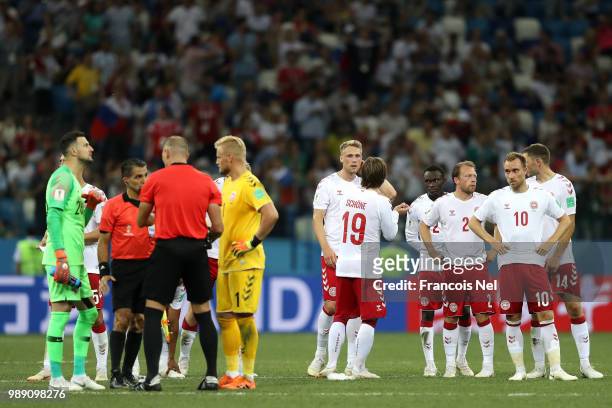 Denmark and Croatia players speak ahead of the penalty shoot out during the 2018 FIFA World Cup Russia Round of 16 match between Croatia and Denmark...