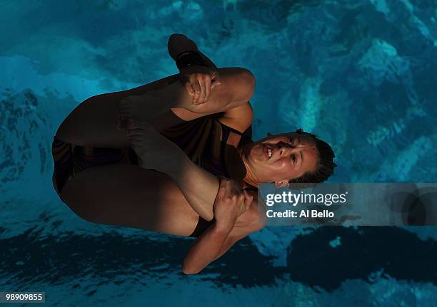 Inge Jansen of The Netherlands dives during the Women's 3 meter springboard preliminaries at the Fort Lauderdale Aquatic Center during Day 2 of the...