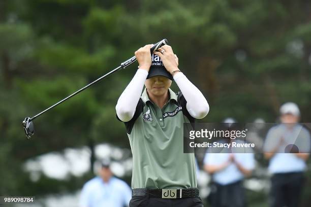 Sung Hyun Park of Korea reacts on the second playoff hole after winning the 2018 KPMG Women's PGA Championship at Kemper Lakes Golf Club on July 1,...