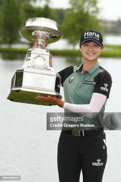 Sung Hyun Park of Korea poses with the championship trophy after winning the 2018 KPMG PGA Championship at Kemper Lakes Golf Club on July 1, 2018 in...