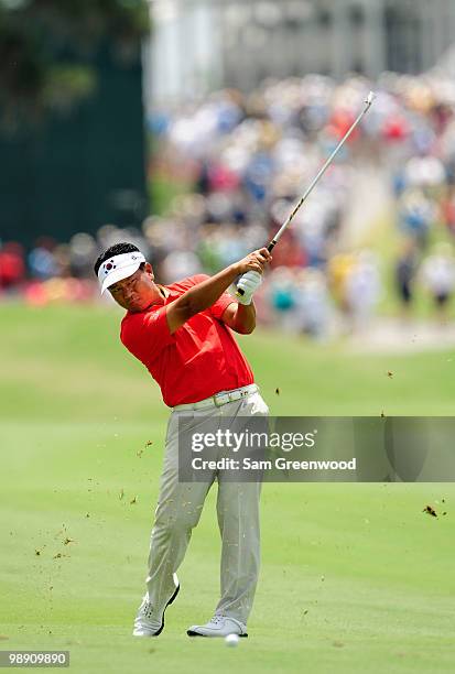 Choi of South Korea hits an approach shot on the fairway of the 18th hole during the second round of THE PLAYERS Championship held at THE PLAYERS...