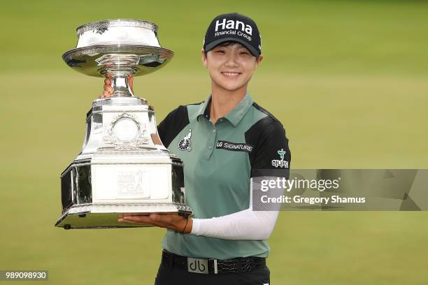 Sung Hyun Park of Korea poses with the championship trophy after winning the 2018 KPMG PGA Championship at Kemper Lakes Golf Club on July 1, 2018 in...