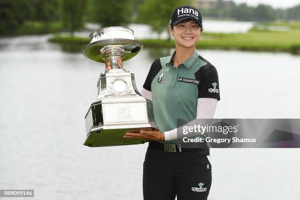 Sung Hyun Park of Korea poses with the championship trophy after winning the 2018 KPMG PGA Championship at Kemper Lakes Golf Club on July 1, 2018 in...