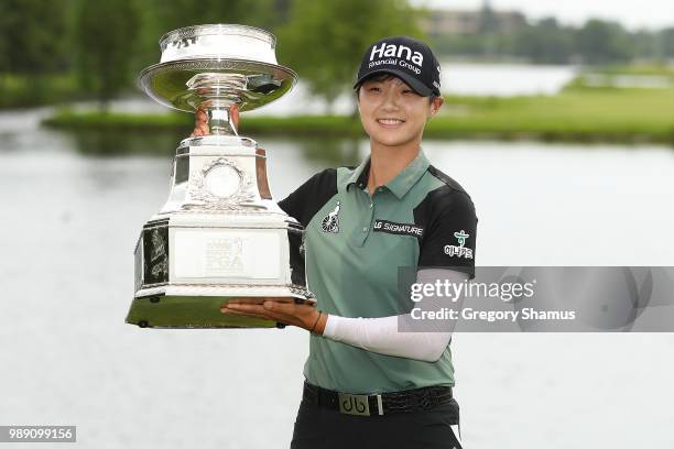 Sung Hyun Park of Korea poses with the championship trophy after winning the 2018 KPMG PGA Championship at Kemper Lakes Golf Club on July 1, 2018 in...