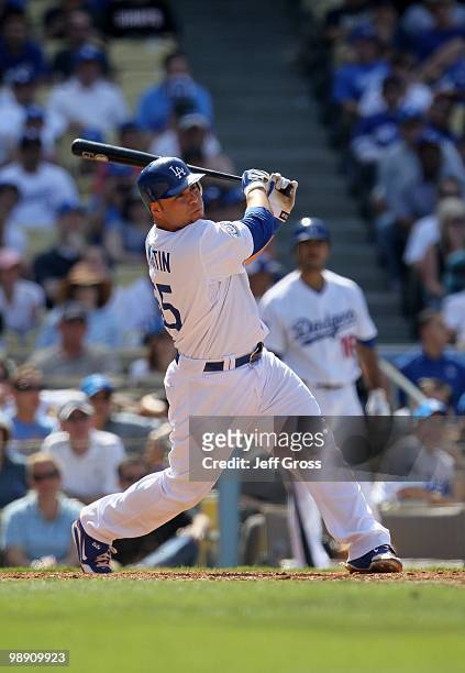 Russell Martin of the Los Angeles Dodgers bats against the San Francisco Giants at Dodger Stadium on April 18, 2010 in Los Angeles, California. The...