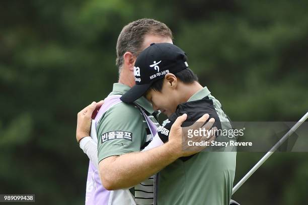 Sung Hyun Park of Korea embraces her caddie on the second playoff hole after winning the 2018 KPMG Women's PGA Championship at Kemper Lakes Golf Club...
