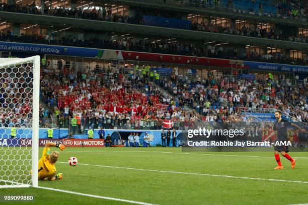 Kasper Schmeichel of Denmark saves the penalty of Milan Badelj of Croatia during a penalty shootout during the 2018 FIFA World Cup Russia Round of 16...