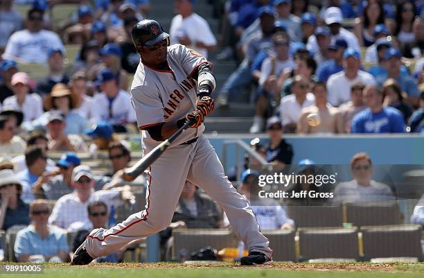 Juan Uribe of the San Francisco Giants bats against the Los Angeles Dodgers at Dodger Stadium on April 18, 2010 in Los Angeles, California. The...