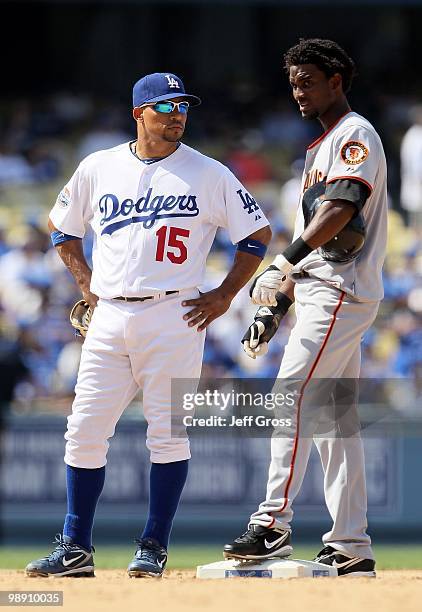 Rafael Furcal of the Los Angeles Dodgers and Eugenio Velez of the San Francisco Giants talk at Dodger Stadium on April 18, 2010 in Los Angeles,...