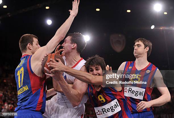 Sasha Kaun, #24 of CSKA Moscow competes with Ricky Rubio, #9 of Regal FC Barcelona during the Euroleague Basketball Senifinal 1 between Regal FC...