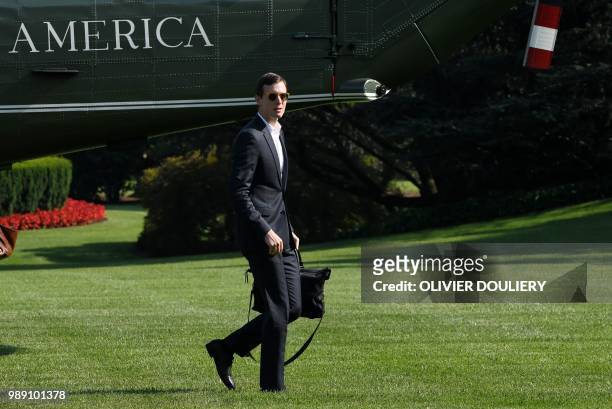 Jared Kushner, a senior adviser and son-in-law of US President Donald Trump, crosses the South Lawn upon arrival at the White House on July 1, 2018...