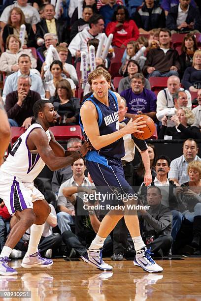 Dirk Nowitzki of the Dallas Mavericks posts up against Donte Greene of the Sacramento Kings during the game at Arco Arena on April 10, 2010 in...