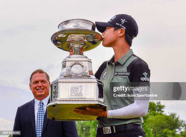 Sung Hyun Park of Korea kisses the championship trophy after winning the KPMG Women's PGA Championship on July 1, 2018 at the Kemper Lakes Golf Club...