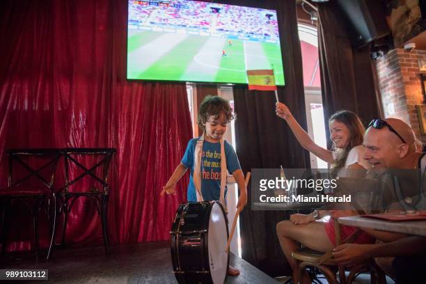 Samuel Valdes plays a drum on stage at Tapas and Tintos, a restaurant in Miami Beach, Fla. Where fans gathered to watch Spain take on Russia during...