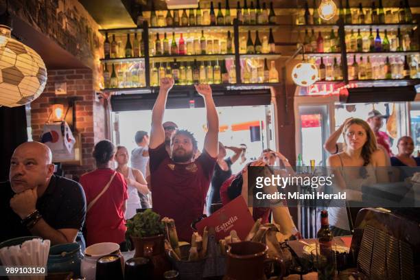 Kevin Zatkovich reacts to a Russia goal at Tapas and Tintos, a restaurant in Miami Beach, Fla. Where fans gathered to watch Spain take on Russia...