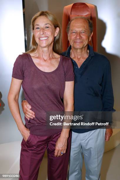 Jean-Claude Meyer and his wife Nathalie Bloch-Laine attend "L'Alchimie secrete d'une collection - The Secret Alchemy of a Collection" Exhibition...