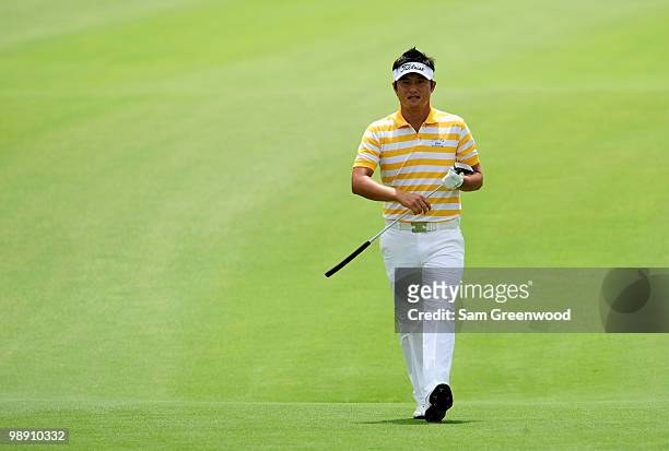 Ryuji Imada of Japan walks up the fairway on the 18th hole during the second round of THE PLAYERS Championship held at THE PLAYERS Stadium course at...