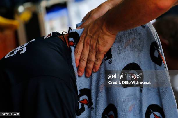 Tyler Flowers of the Atlanta Braves cools down in the dugout in-between innings against the St. Louis Cardinals at Busch Stadium on July 1, 2018 in...