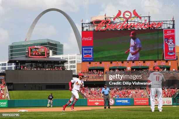 Tommy Pham of the St. Louis Cardinals rounds the bases after hitting a two-run home run against the Atlanta Braves in the seventh inning at Busch...