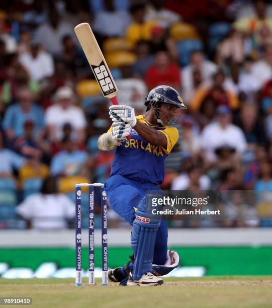Kumar Sangakkara of Sri Lanka hits out during The ICC World Twenty20 Super Eight Match between The West Indies and India played at The Kensington...