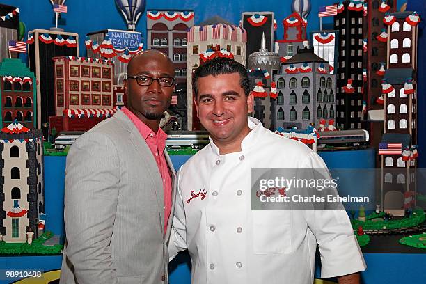 Actor Taye Diggs and "Cake Boss" Buddy Valestro attend Amtrak's National Train Day celebration at Penn Station on May 7, 2010 in New York City.