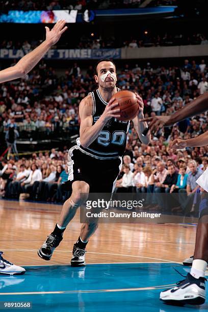 Manu Ginobili of the San Antonio Spurs drives to the basket against the Dallas Mavericks in Game Five of the Western Conference Quarterfinals during...