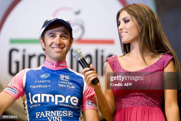 Italian cyclist Gilberto Simoni talks to Yolanthe Cabau van Kasbergen during the grand team presentation of the 2010 Giro in the Beurs van Berlage in...