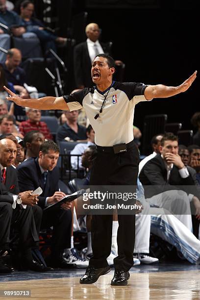 Referee Bill Kennedy makes a call during the game between the Philadelphia 76ers and the Memphis Grizzlies at the FedExForum on April 10, 2010 in...