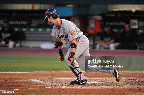 Aaron Rowand of the San Francisco Giants runs to first base during a MLB game against the Florida Marlins in Sun Life Stadium on May 5, 2010 in...