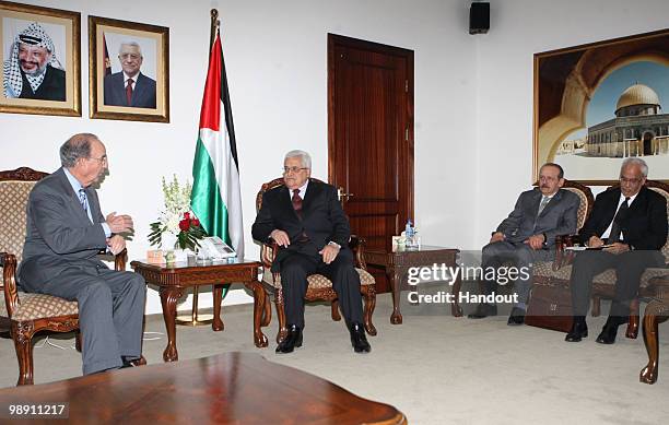 In this handout image from the Palestinian Press Office, Palestinian President Mahmoud Abbas receives U.S. Mideast envoy George Mitchell during their...