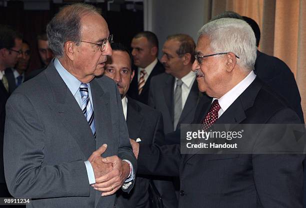 In this handout image from the Palestinian Press Office, Palestinian President Mahmoud Abbas receives U.S. Mideast envoy George Mitchell during their...