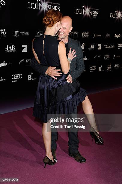 Actress Andrea Sawatzki and husband Christian Berkel attend the 'Duftstars 2010' at the Station on May 7, 2010 in Berlin, Germany.