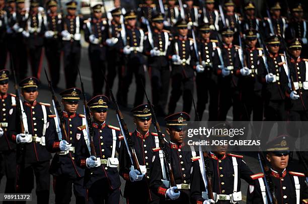 Salvadorean soldiers march during a parade to conmemorate the Salvadorean Armed forces day in San Salvador, El Salvador, on May 7, 2010. The...