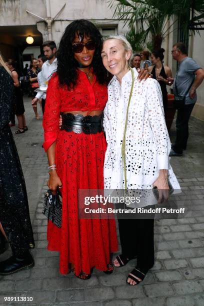 Model Naomi Campbell and Carla Sozzani attend "L'Alchimie secrete d'une collection - The Secret Alchemy of a Collection" Exhibition Preview at...