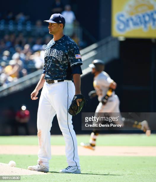 Tyson Ross of the San Diego Padres looks toward the plate after giving up a solo home run to Elias Diaz of the Pittsburgh Pirates during the sixth...