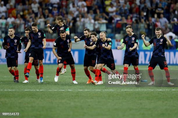 Players of Croatia celebrate during a penalty shootout on the 2018 FIFA World Cup Russia Round of 16 match between Croatia and Denmark at the Nizhny...