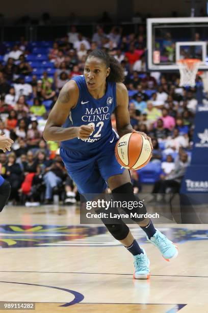 Rebekkah Brunson of the Minnesota Lynx handles the ball against the Dallas Wings on July 1, 2018 at College Park Center in Arlington, Texas. NOTE TO...