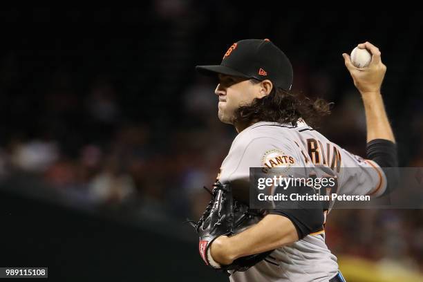 Relief pitcher Cory Gearrin of the San Francisco Giants pitches against the Arizona Diamondbacks during the fourth inning of the MLB game at Chase...